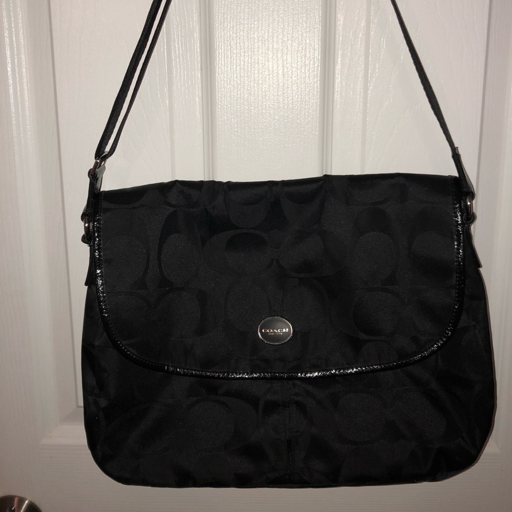 Water resistant Coach satchel style bag
